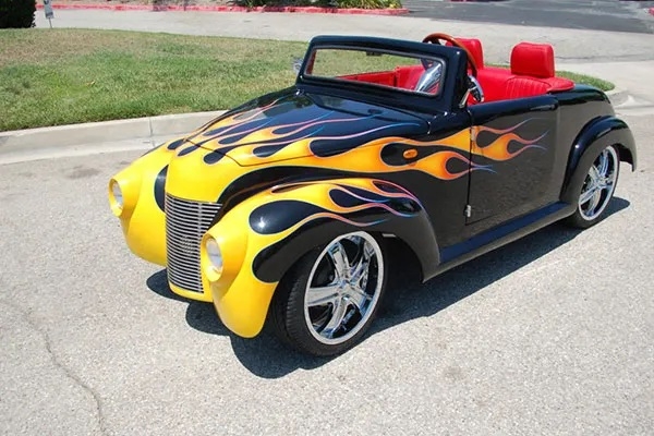 Black 39 Roadster with Yellow Flames affordable golf cart rental, golf cart rent marathon