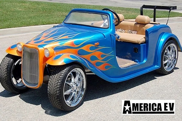 Blue California Roadster with Orange Flames affordable golf cart rental, golf cart rent marathon