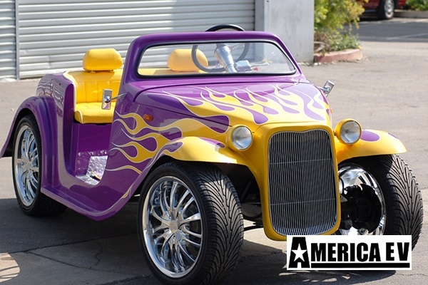 Purple California Roadster with Yellow Flames affordable golf cart rental, golf cart rent marathon