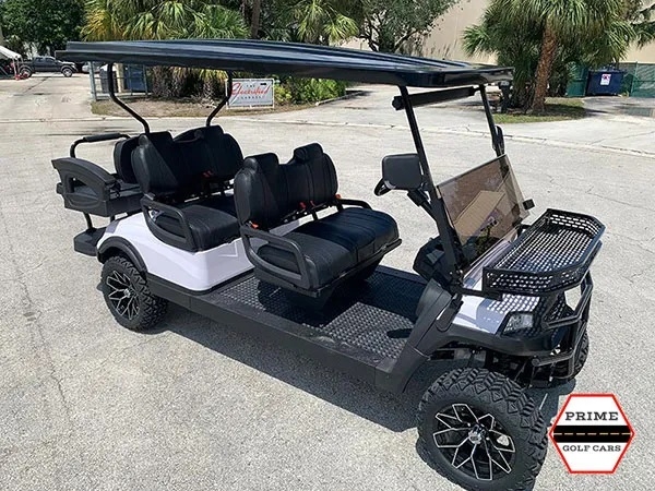 White Aluma 6 Passenger Lifted Golf Cart affordable golf cart rental, golf cart rent marathon